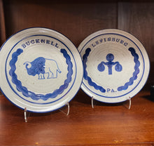 Load image into Gallery viewer, Bucknell University and Lewisburg, PA pottery plates with a lamppost and bison design.