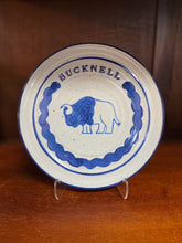 Load image into Gallery viewer, Bucknell pottery plate with bison design and navy blue details.