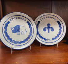 Load image into Gallery viewer, Bucknell University and Lewisburg, PA pottery plates with a lamppost and bison design.
