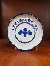 Load image into Gallery viewer, Lewisburg, PA pottery spoon rest with lamppost design and navy blue details.
