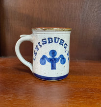 Load image into Gallery viewer, Lewisburg, PA pottery mug with a thick handle and lamppost design.
