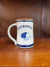 Load image into Gallery viewer, Bucknell pottery tankard with a thick handle and bison design.
